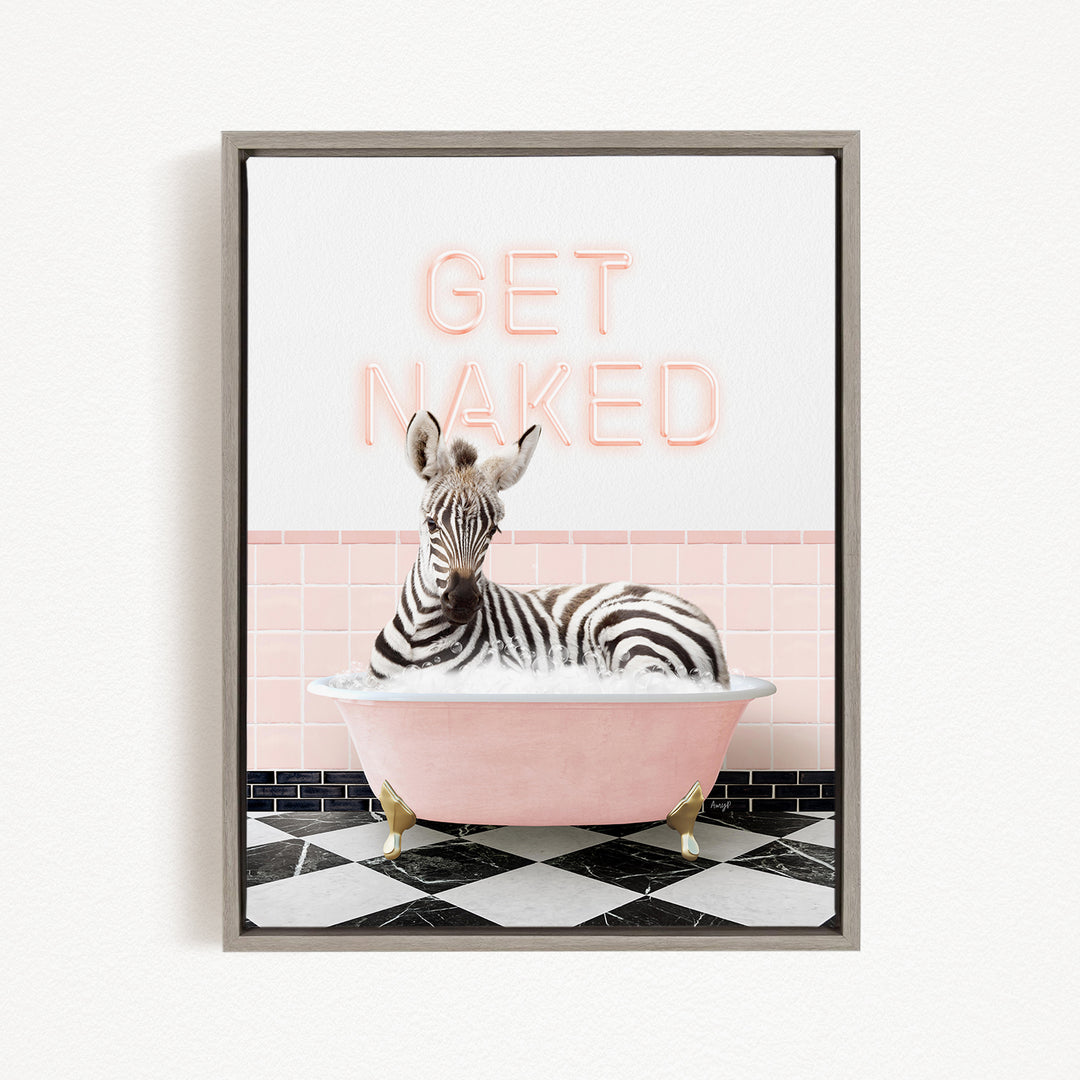 A zebra sitting in a pink bathtub with the text "GET NAKED" displayed above it.