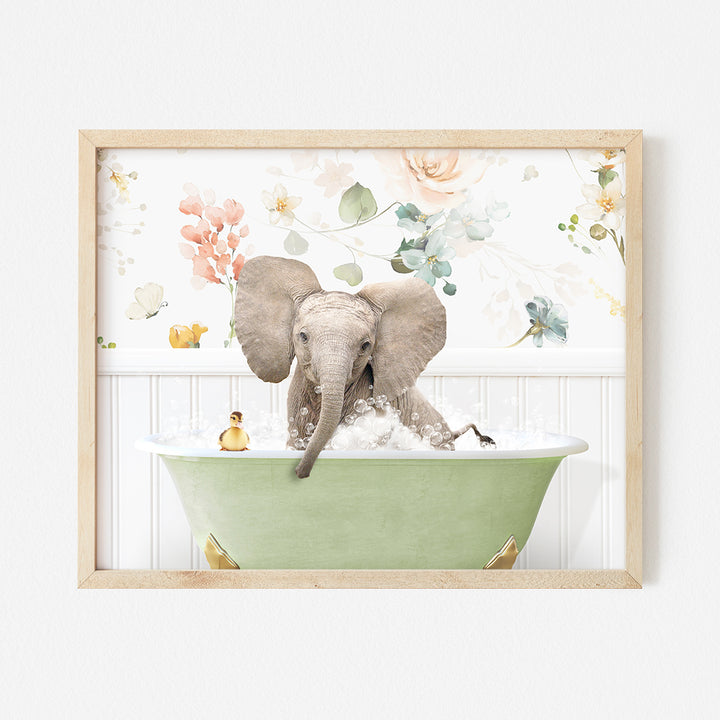 an elephant taking a bath in a green bathtub