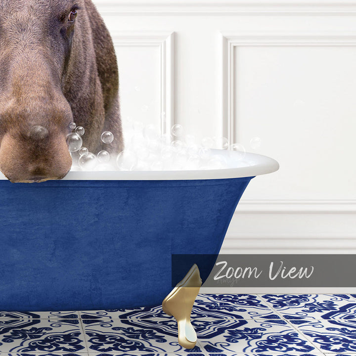 A close-up of a dog's face peeking out of a blue bathtub filled with bubbles, with a white wall and patterned floor in the background.