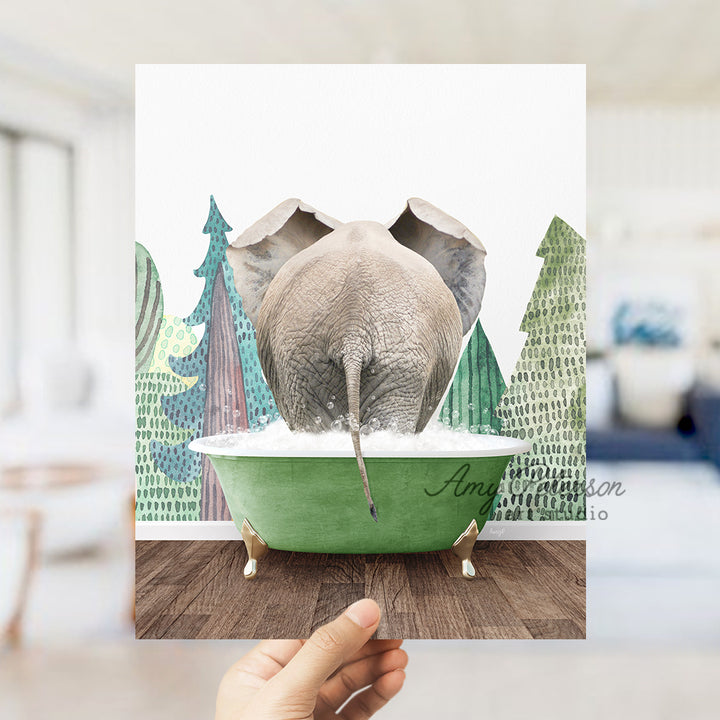 a person holding up a card with an elephant in a bathtub