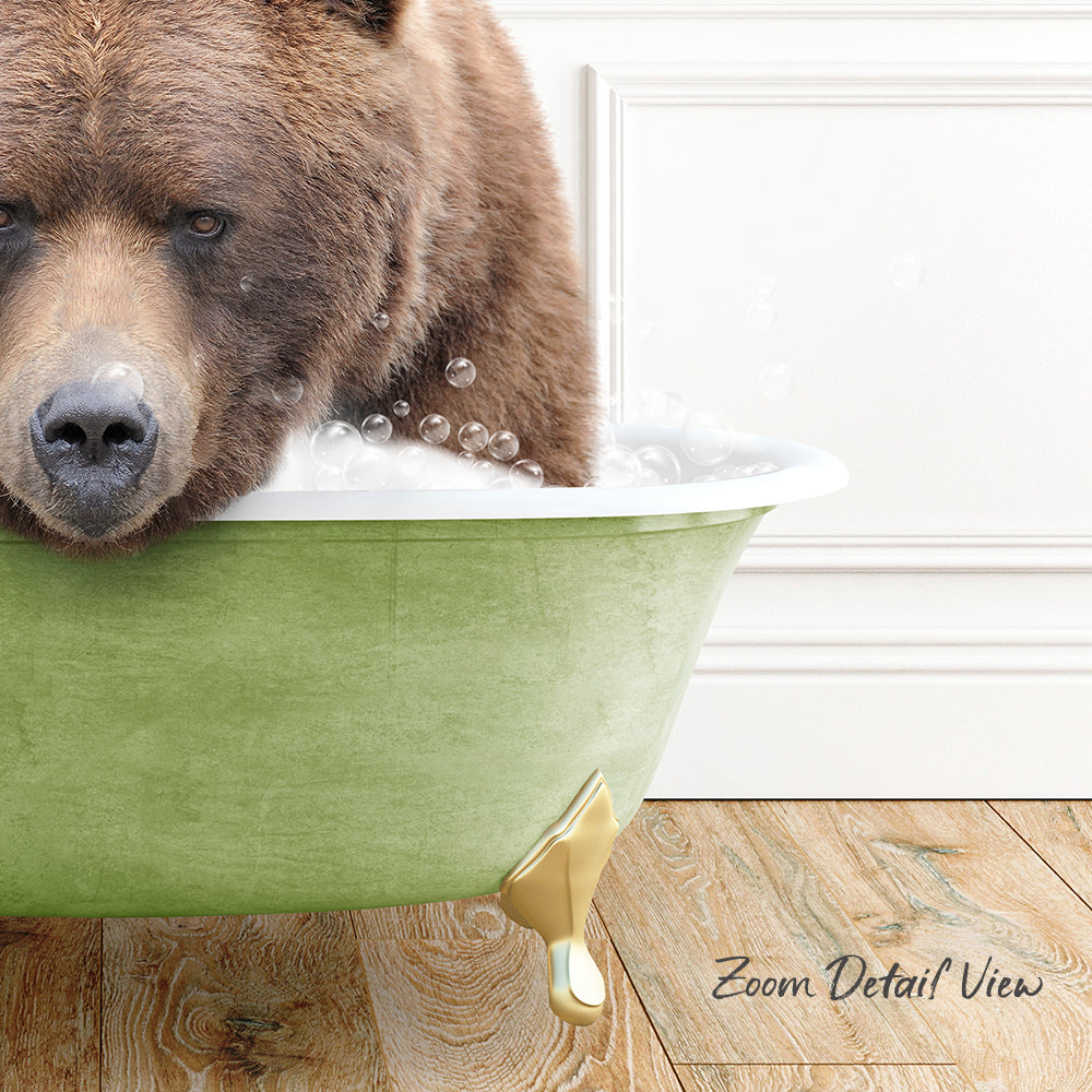 A brown bear is sitting in a green bathtub filled with bubbles, with a wooden floor visible in the background.