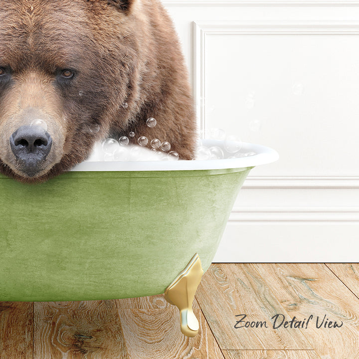 A brown bear is sitting in a green bathtub filled with bubbles, with a wooden floor visible in the background.