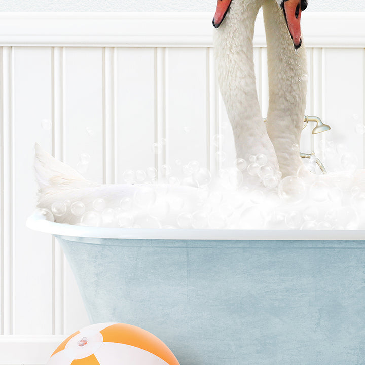 a white swan in a bath tub with bubbles