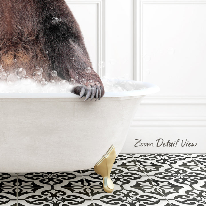 A close-up of a bear's paw resting on the edge of a white bathtub filled with bubbles, with a black and white patterned floor in the background.