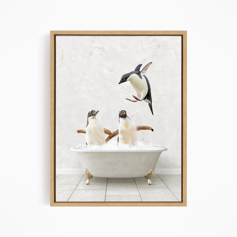A framed image depicting two penguins sitting in a bathtub, with one penguin flying towards the other.