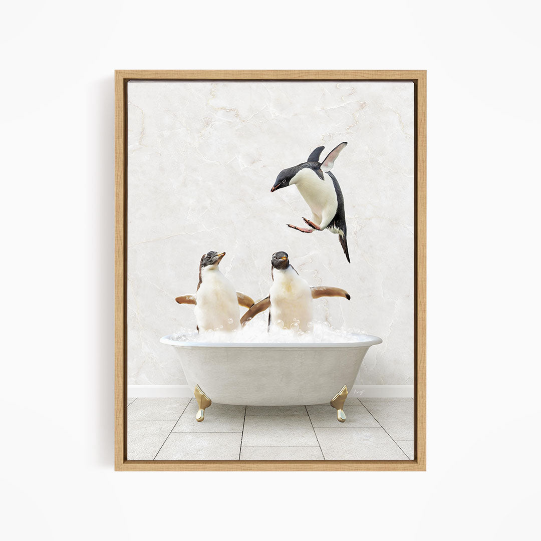 A framed image depicting two penguins sitting in a bathtub, with one penguin flying towards the other.