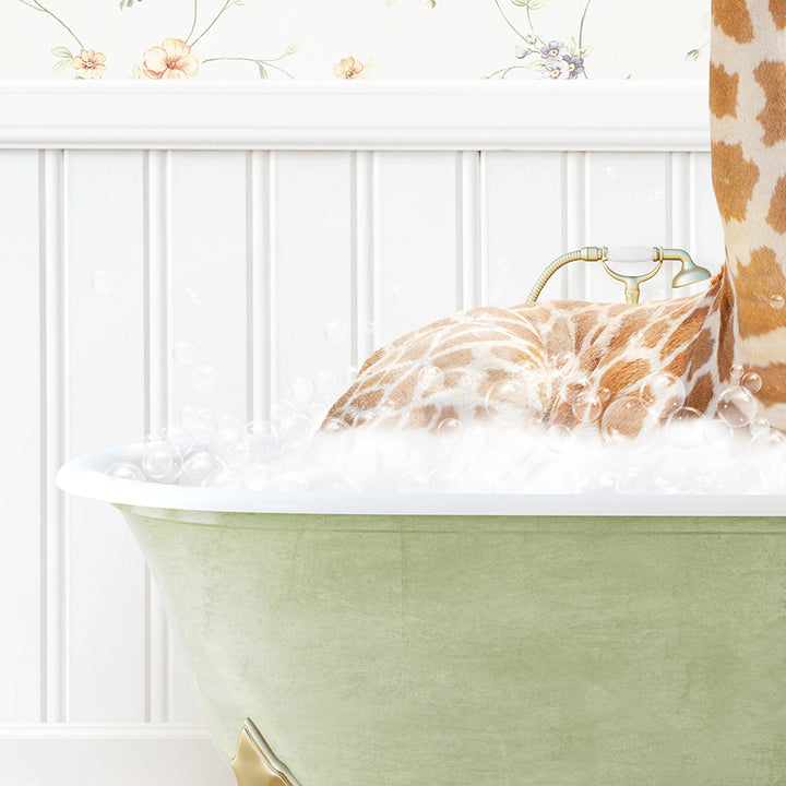 a giraffe laying down in a bath tub