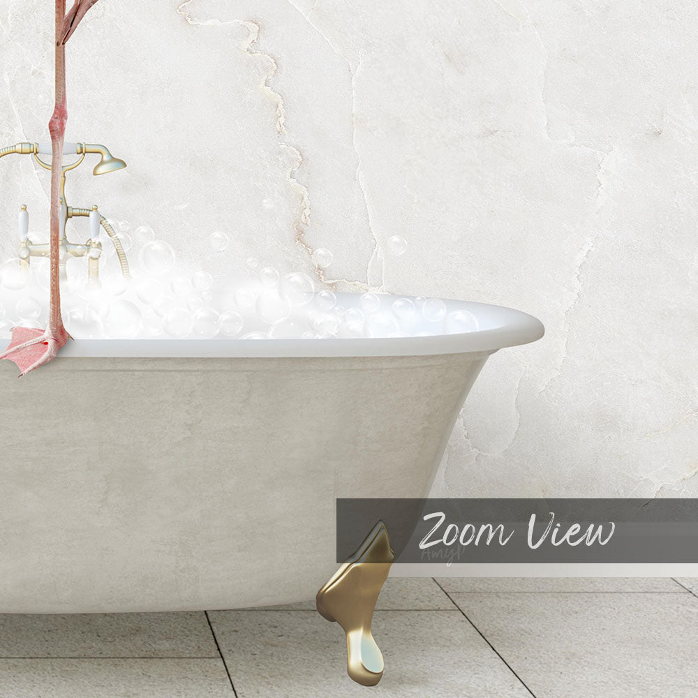 A white claw-foot bathtub filled with bubbles, with a gold faucet and a pink flower in the tub.
