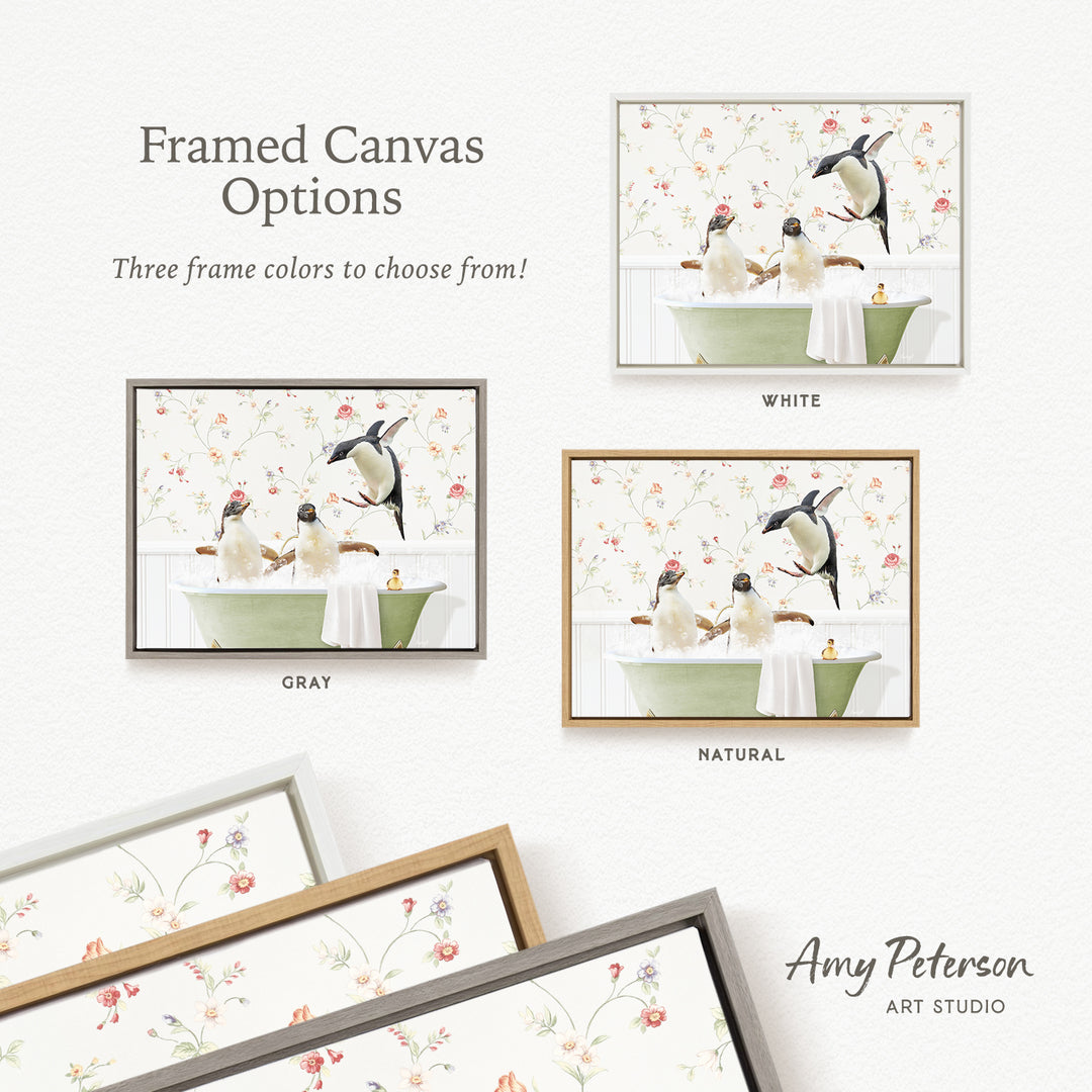 The image is a framed canvas with three different frame colors to choose from: white, gray, and natural. The canvas features a whimsical scene of penguins bathing in a green tub, with a floral pattern on the wall behind them.