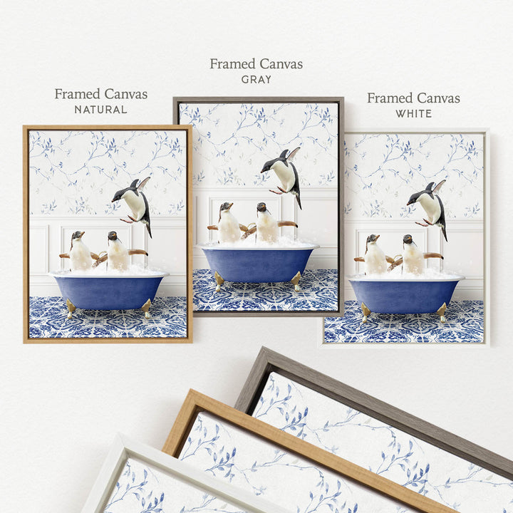 The image is a framed canvas depicting a group of penguins sitting in a blue bathtub, with one penguin standing on the edge of the tub. The image is framed in three different colors: natural, gray, and white.