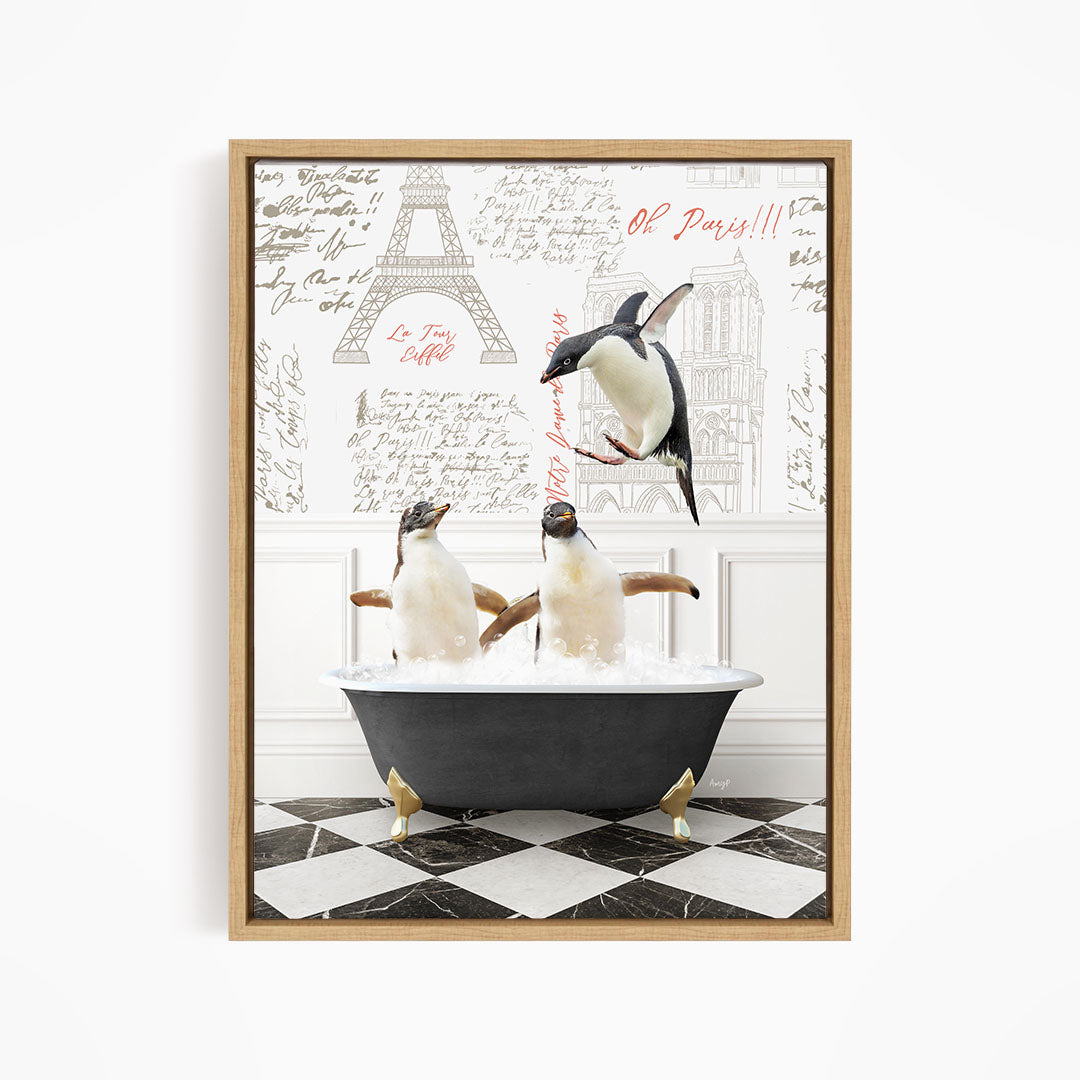 A framed image depicting three penguins sitting in a bathtub, with one penguin flying above the tub.
