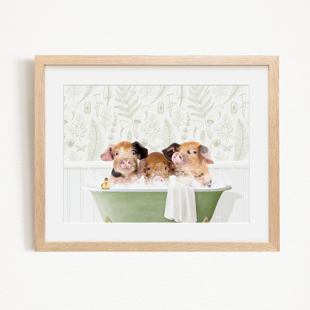 Three adorable pigs sitting in a green bathtub, enjoying a relaxing bath together.