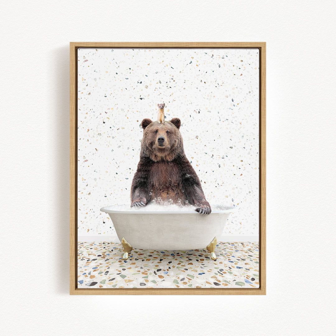 A brown bear sitting in a bathtub filled with water, with a small bird perched on its head.