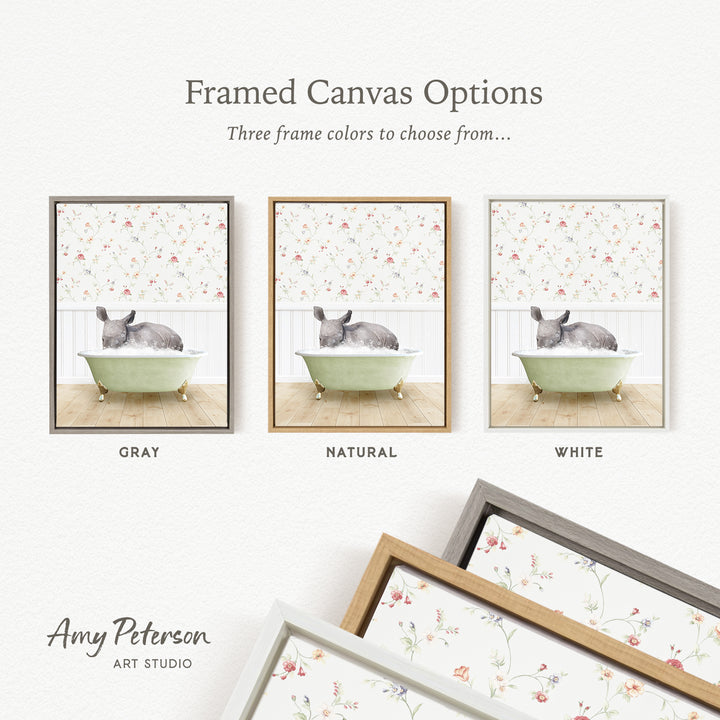 three framed canvas options featuring a gray rabbit sitting in a green bathtub, with each option having a different frame color: gray, natural, and white.