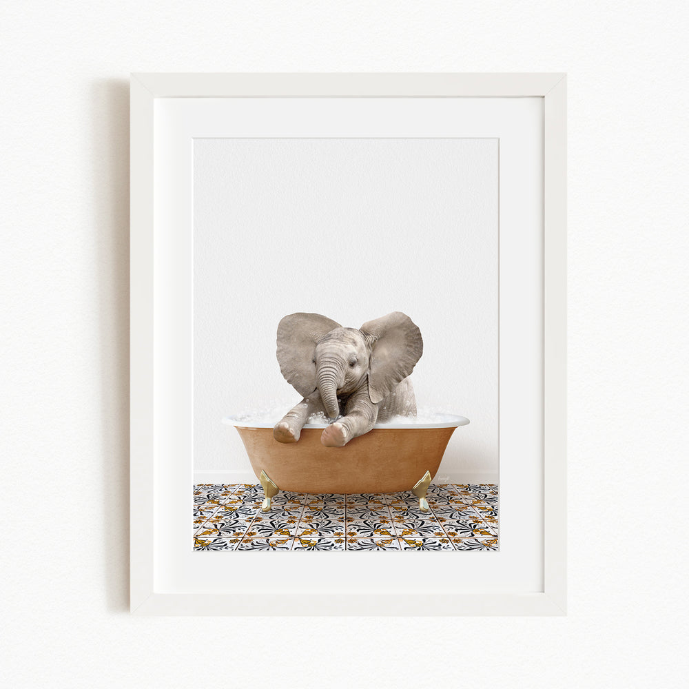 A baby elephant sitting in a bathtub filled with water, surrounded by a patterned tile floor.