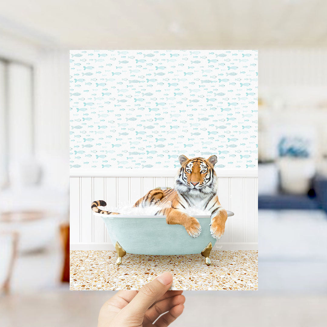 A tiger is sitting in a bathtub filled with water, surrounded by a pattern of fish.
