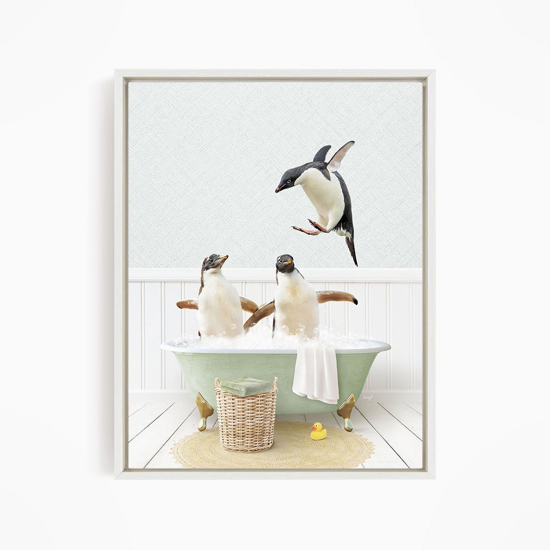 A framed image depicting two penguins sitting in a bathtub, with one penguin flying towards the other penguin.