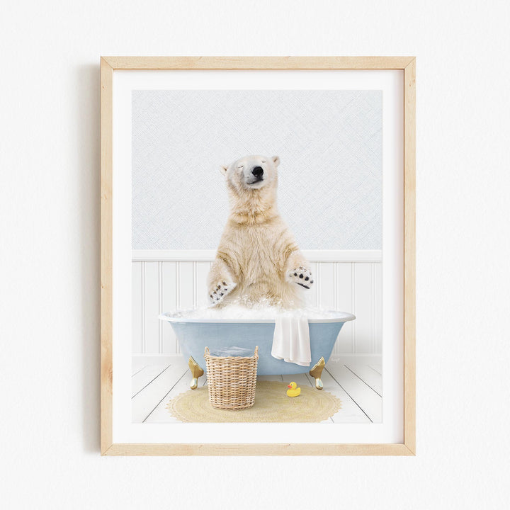 A polar bear sitting in a bathtub filled with water, surrounded by rubber ducks and a towel.
