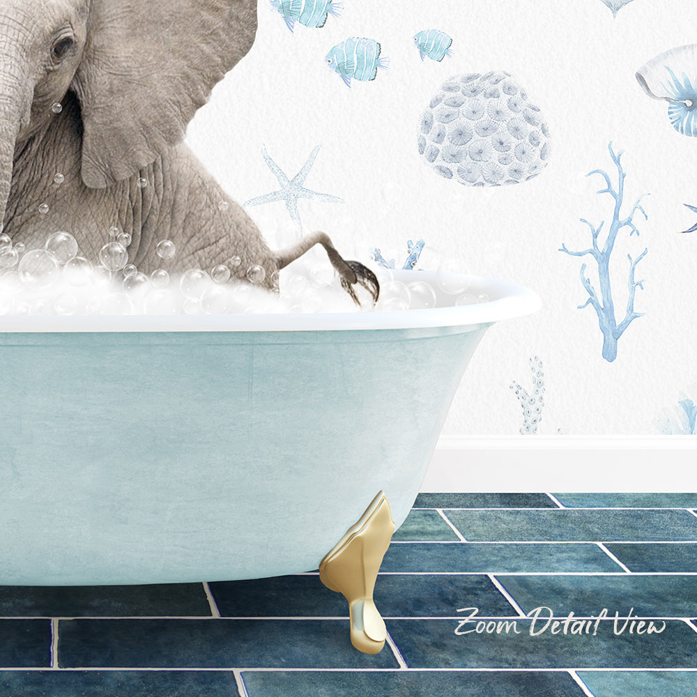 A large elephant is sitting in a bathtub filled with bubbles, surrounded by a blue and white ocean-themed wallpaper.