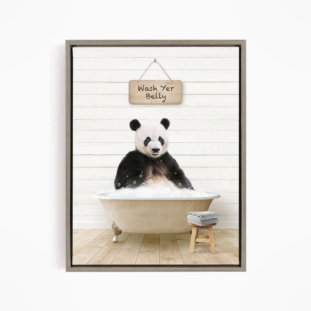 A panda bear sitting in a bathtub, with a sign above that says "Wash Your Belly".