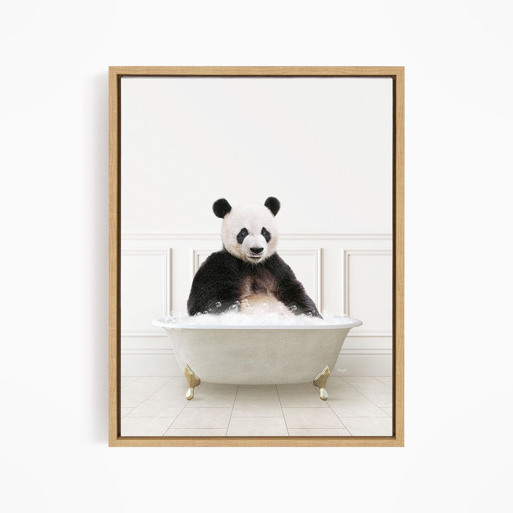 A panda bear sitting in a white bathtub filled with bubbles, appearing to enjoy the bath.