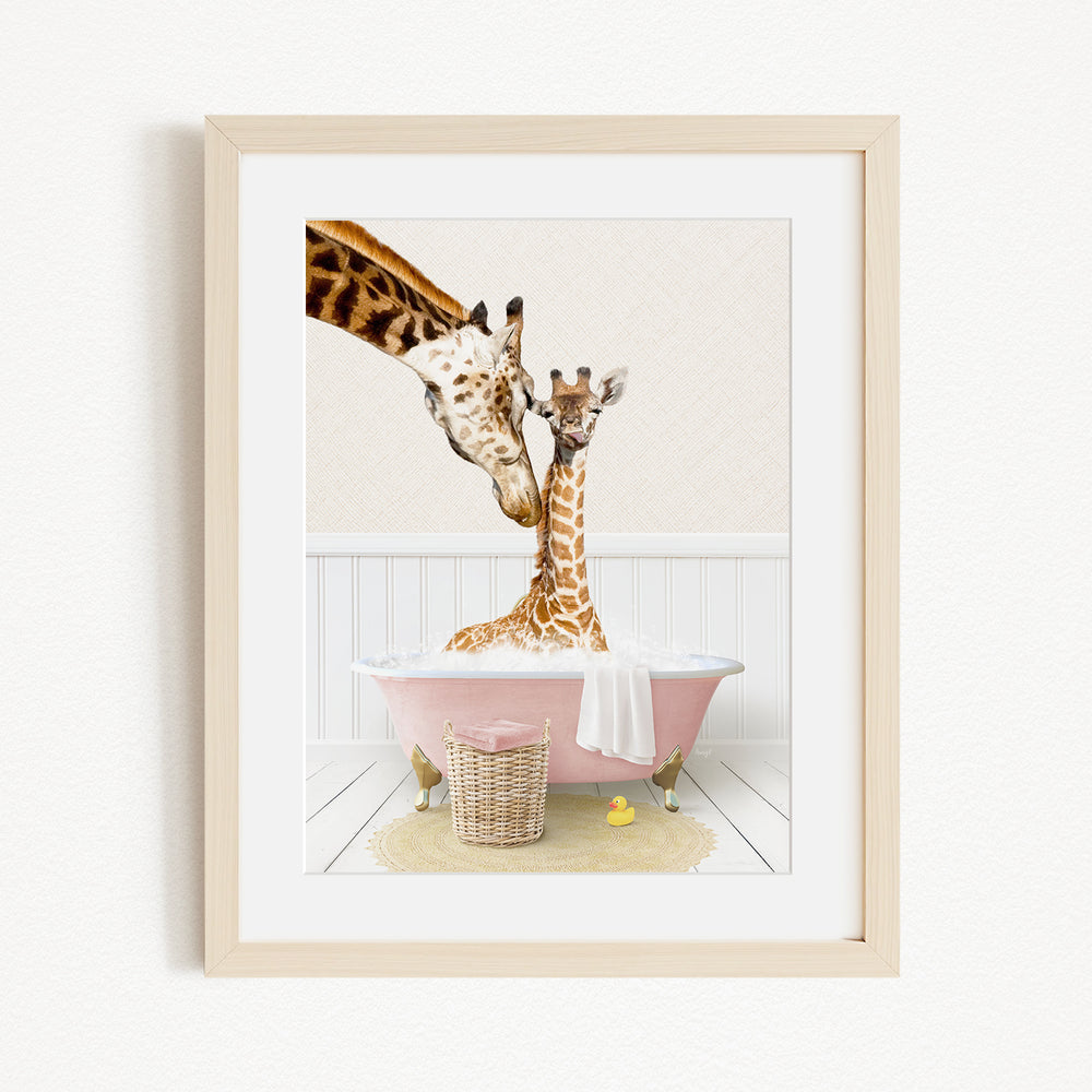 A mother giraffe and her baby giraffe enjoying a bath together in a pink bathtub, with a basket of rubber ducks nearby.