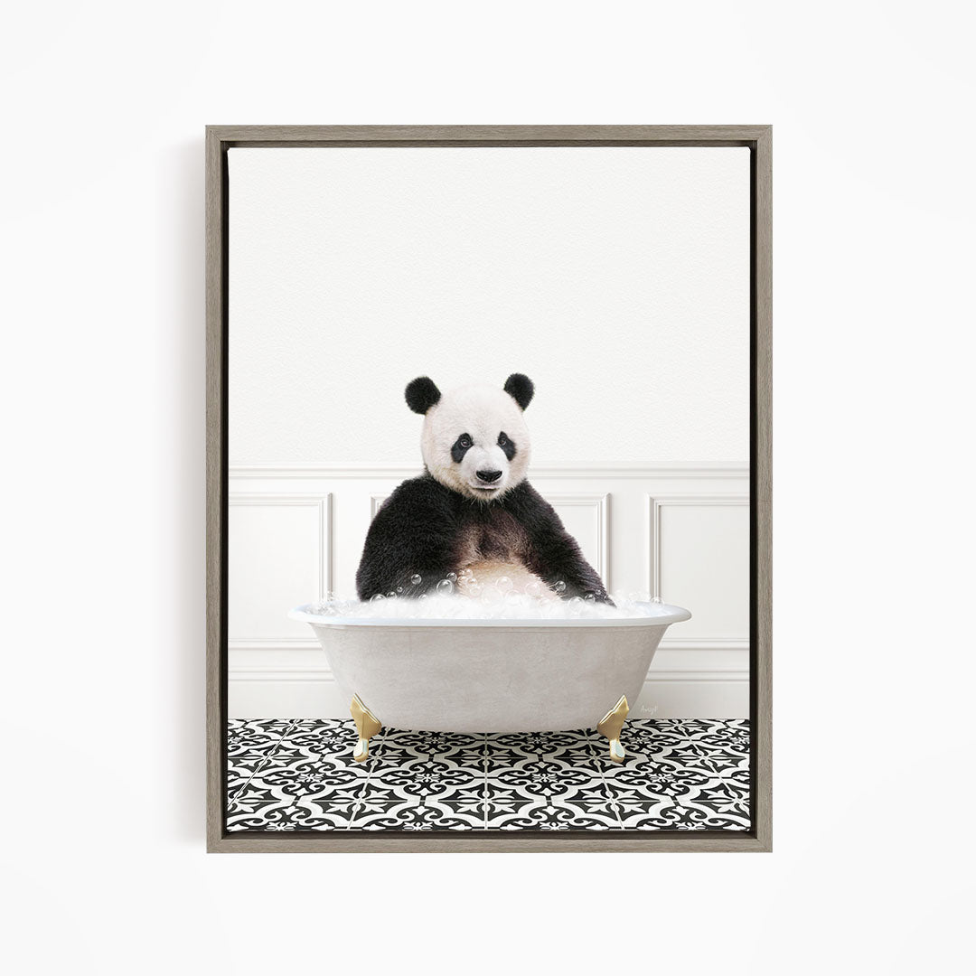 A panda bear sitting in a white bathtub filled with bubbles, surrounded by a black and white patterned floor.