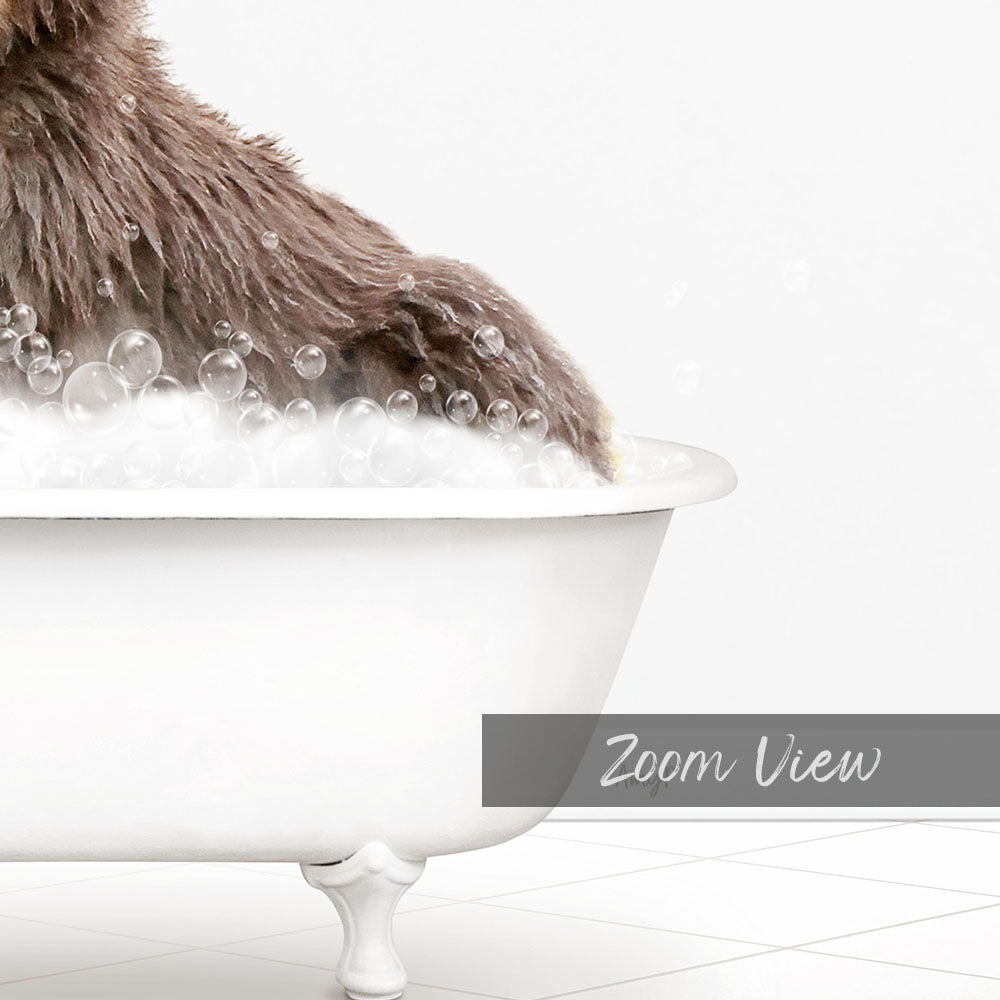 A fluffy brown dog is sitting in a white bathtub filled with bubbles, enjoying a bath.