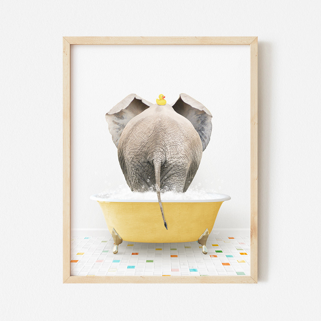 an elephant taking a bath in a yellow bathtub