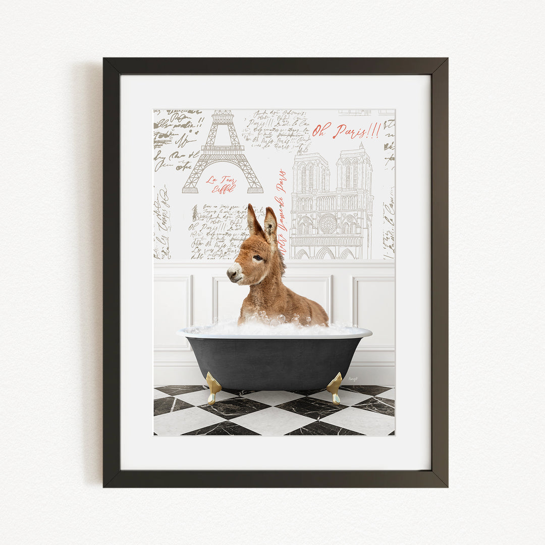 A donkey is sitting in a bathtub filled with water, surrounded by a black and white checkered floor and a framed picture of the Eiffel Tower in the background.