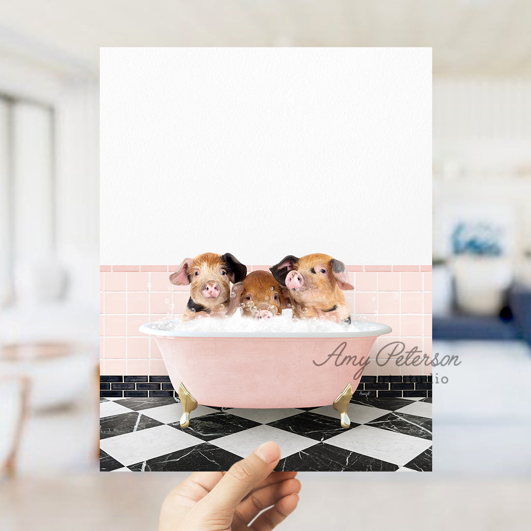 a person holding up a card with three hamsters in a bathtub