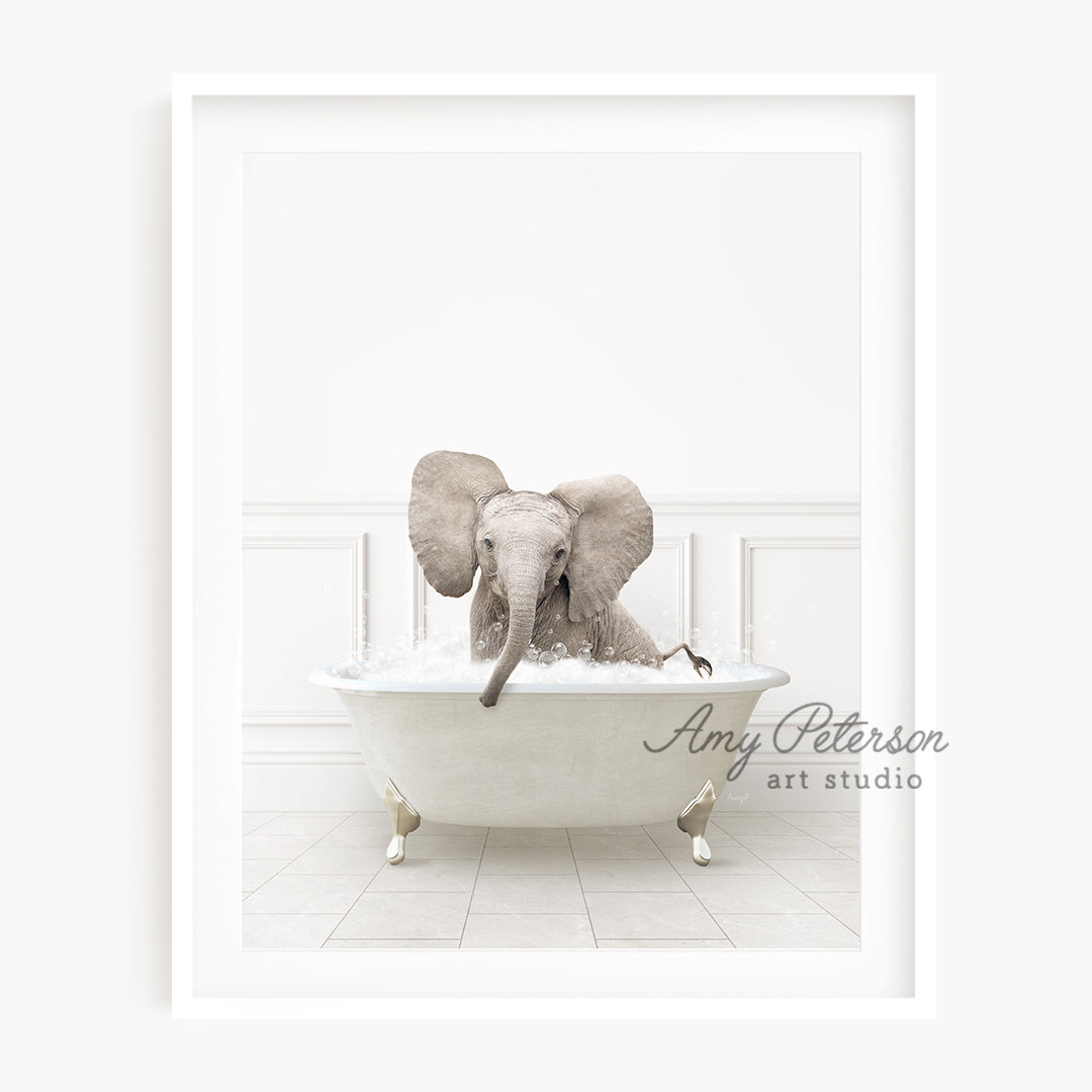 an elephant is taking a bath in a bathtub