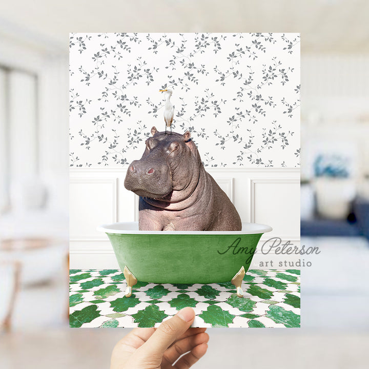 a hippo in a green bathtub with a crown on its head