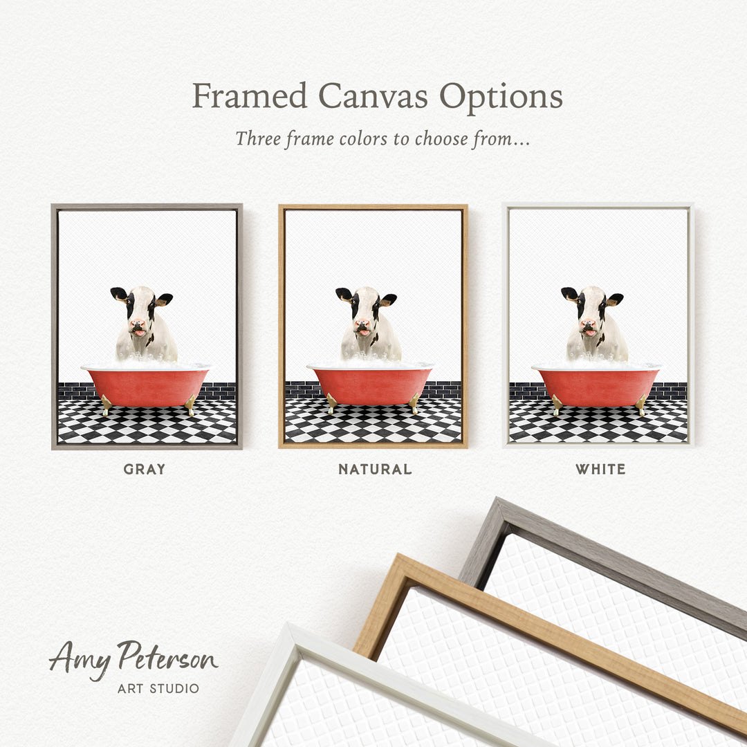 three framed canvas options, each featuring a cow in a red bowl on a black and white checkered floor. The options include a gray frame, a natural frame, and a white frame.