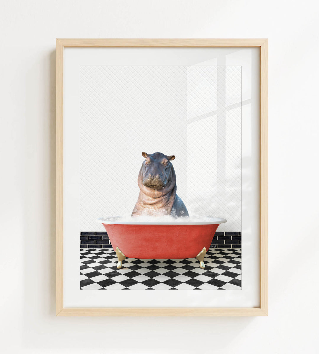 A framed image depicting a hippopotamus sitting in a red bathtub filled with water, surrounded by a black and white checkered floor.