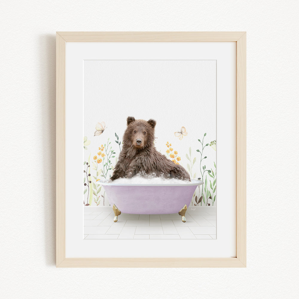 A brown bear sitting in a purple bathtub filled with bubbles, surrounded by flowers and butterflies.