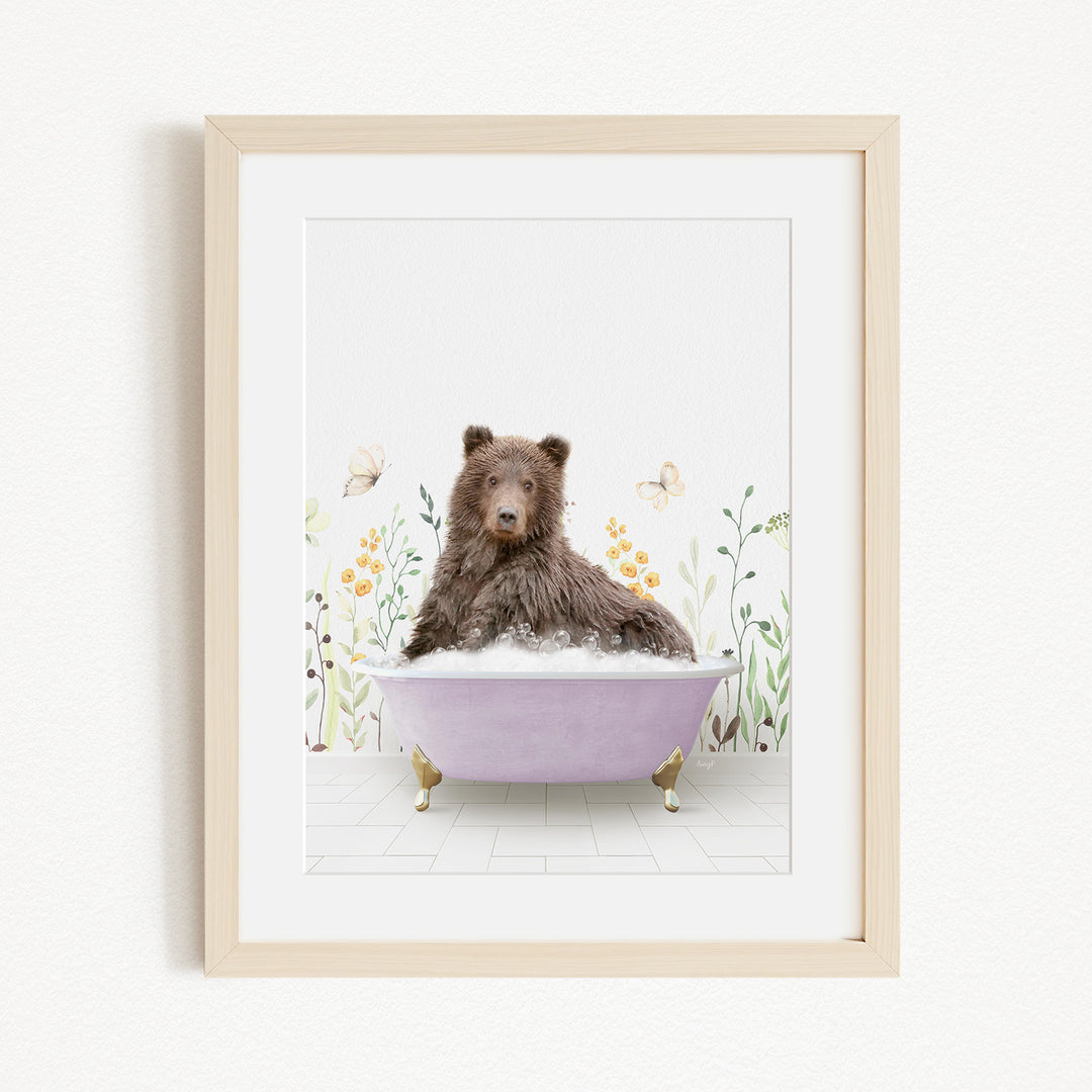 A brown bear sitting in a purple bathtub filled with bubbles, surrounded by flowers and butterflies.
