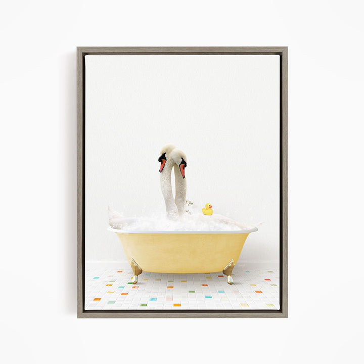 A pair of swans standing in a yellow bathtub filled with bubbles, with a rubber duck floating in the water.