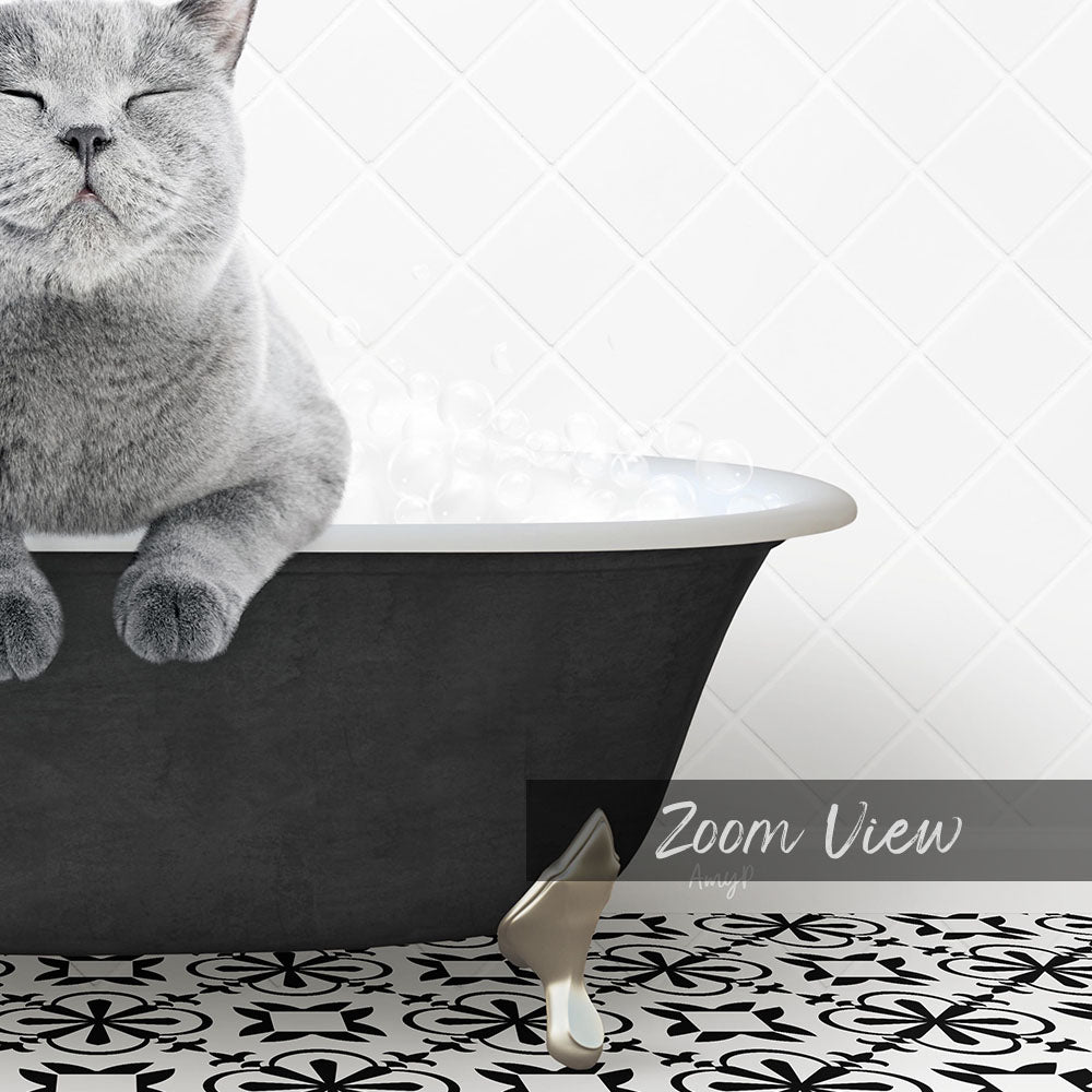A gray cat sitting in a bathtub filled with water, with steam rising from the surface.