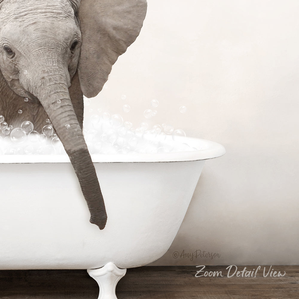 A gray elephant is standing in a white bathtub filled with bubbles, creating a whimsical and playful scene.