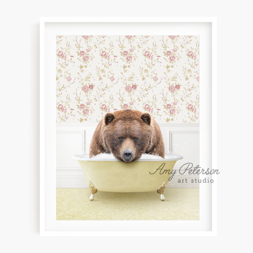 a brown bear sitting in a bath tub