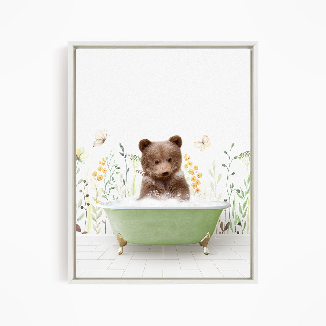 A cute brown bear sitting in a green bathtub filled with bubbles, surrounded by flowers and butterflies.