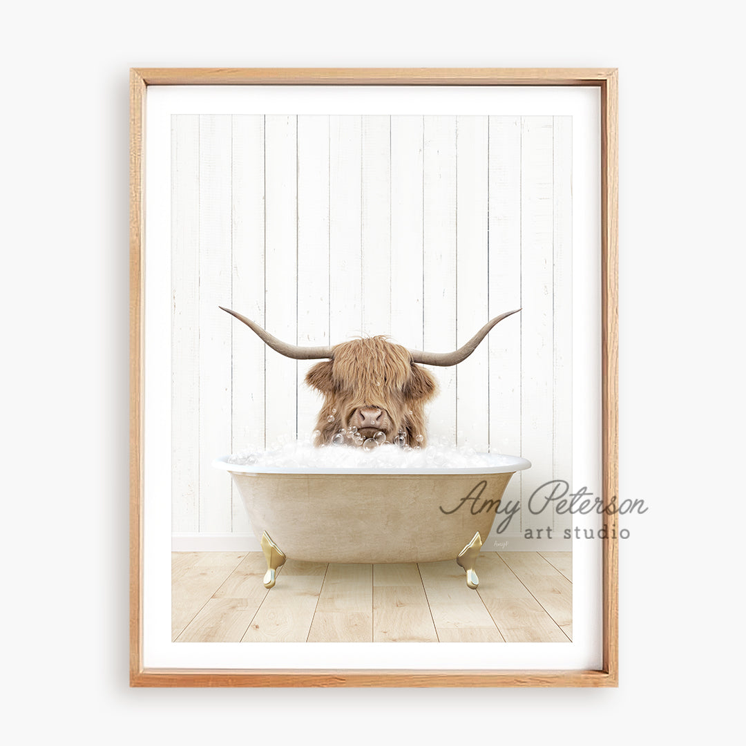 a picture of a bull with long horns in a bathtub