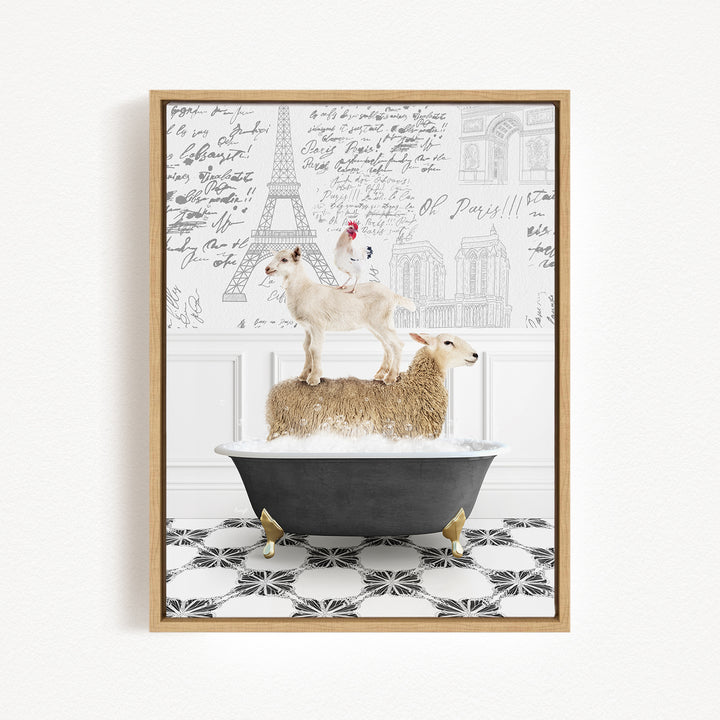 A framed image depicting a sheep standing on a bathtub, with a rooster perched on top of it, against a backdrop of the Eiffel Tower and other Parisian architecture.
