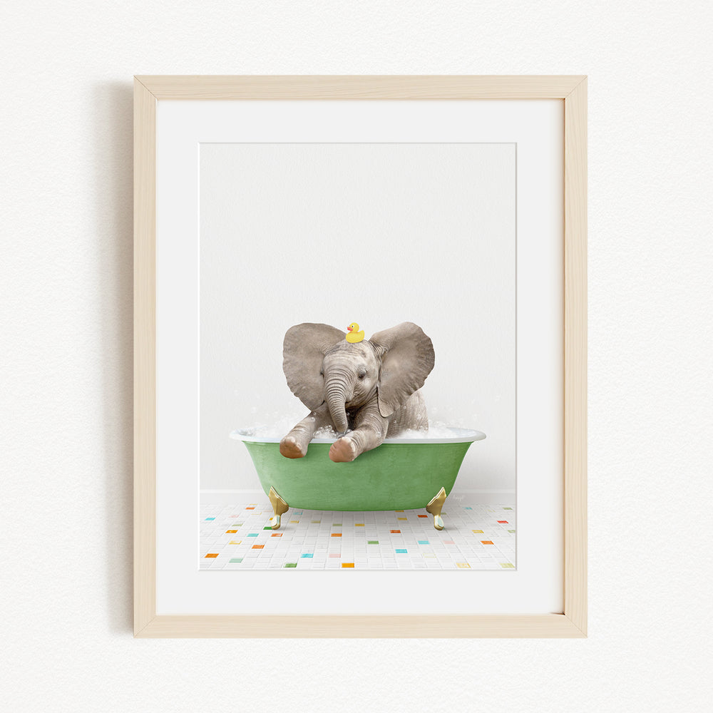 A baby elephant sitting in a green bathtub, surrounded by small yellow birds.