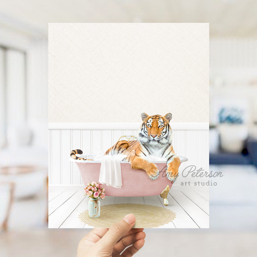 a hand holding a card with a picture of a tiger in a bathtub