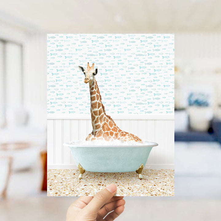 A giraffe sitting in a bathtub filled with bubbles, surrounded by a pattern of fish.