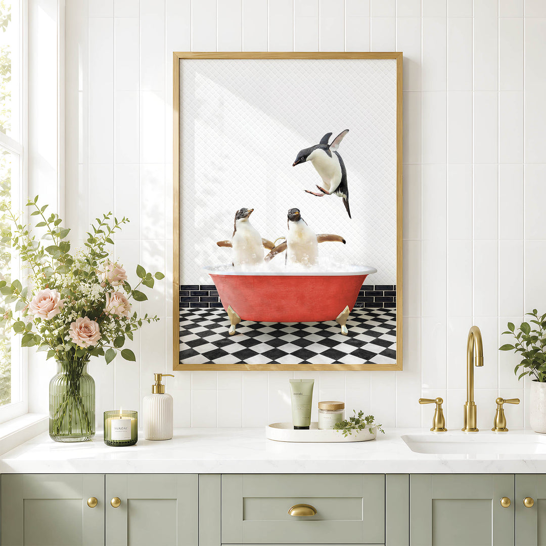 a bathroom scene with a framed picture of two penguins sitting in a bathtub, surrounded by a red tub, a black and white checkered floor, and a vase of pink flowers. The bathroom has a white countertop, a sink, and a framed picture above it.