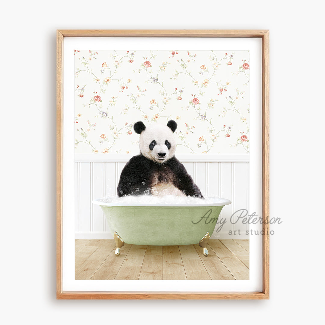 a panda bear sitting in a bath tub