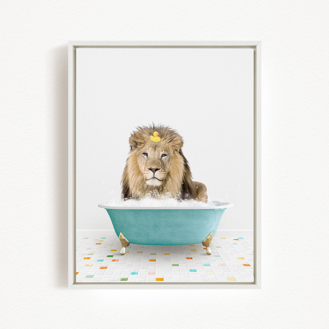 A lion is sitting in a blue bathtub filled with bubbles, with a rubber duck floating on its head.